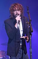 GREAT TEW, OXFORD, ENGLAND - Johnny Borrell of Raz
