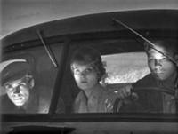 Кадр из фильма 'Последний хлеб', СССР, 1963. На фо