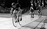 Britain's Reg Harris winning his heat in the profe