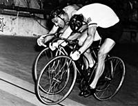 Britain's Reg Harris (foreground) defeating title 