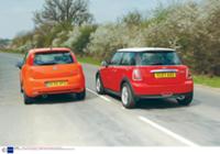Сравниваем авто: 'Mini Cooper D' vs 'Fiat G. Punto'