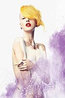 A young woman with a yellow hair piece, her body p