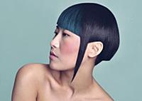 An oriental woman with an unusual asymmetric hairs