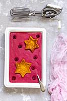 Cold soup of raspberry, banana and yogurt with pum