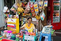MYANMAR / Yangon / 2015 / Roadside stall with a wi