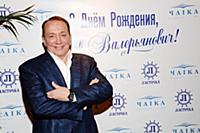 Советский и российский телеведущий Александр Масля