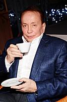 Советский и российский телеведущий Александр Масля