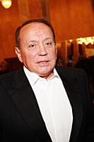 Советский и российский телеведущий Александр Масля